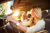 Lady driving in car with sun