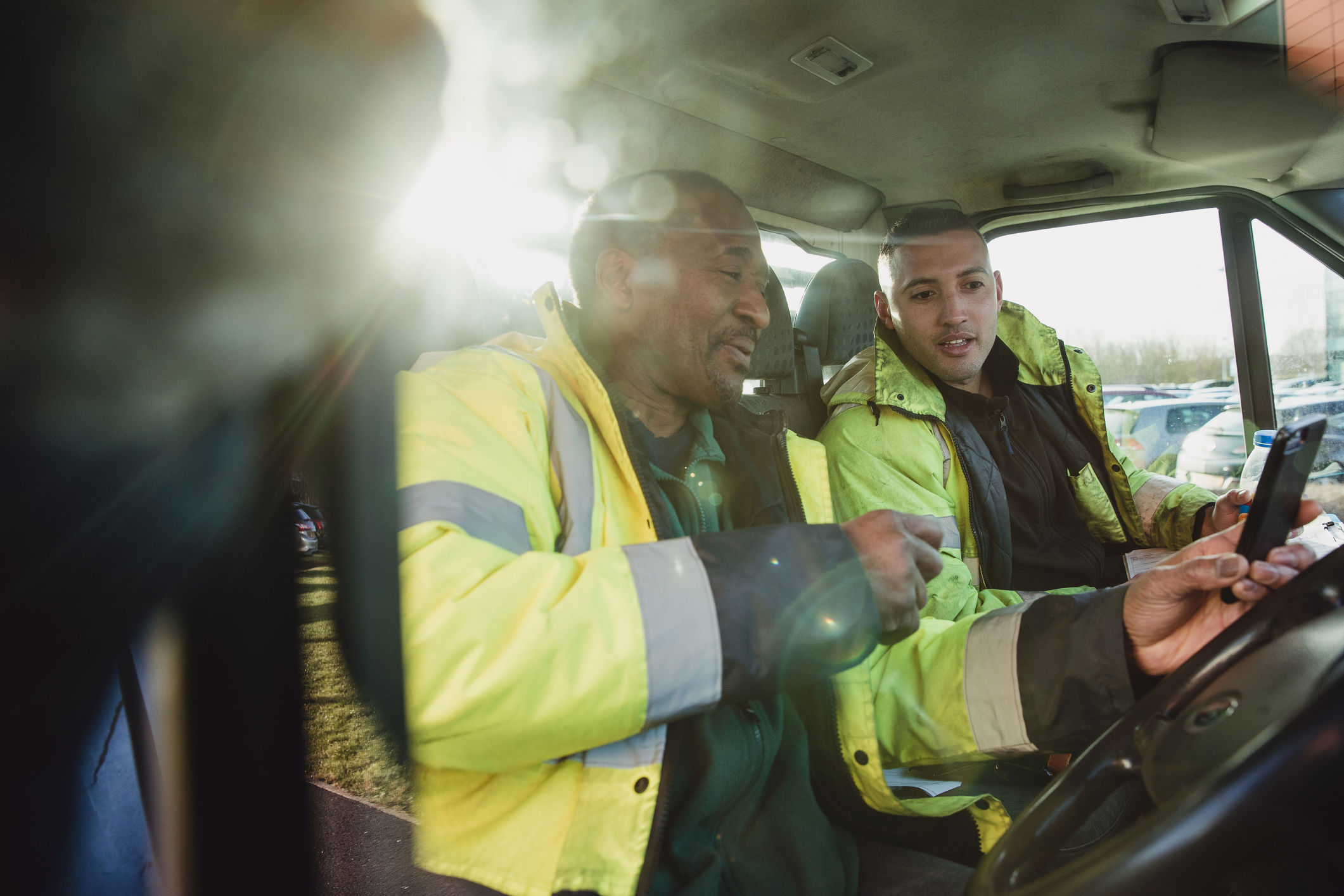 Workmen sat in their van
