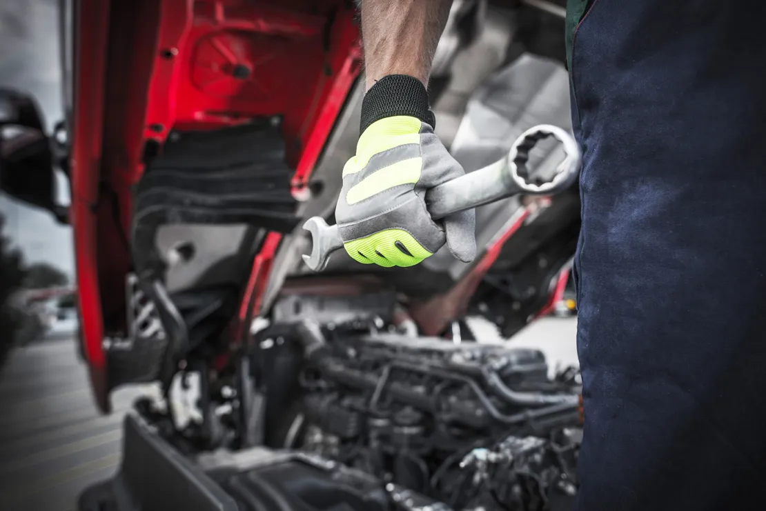 Mechanic with spanner